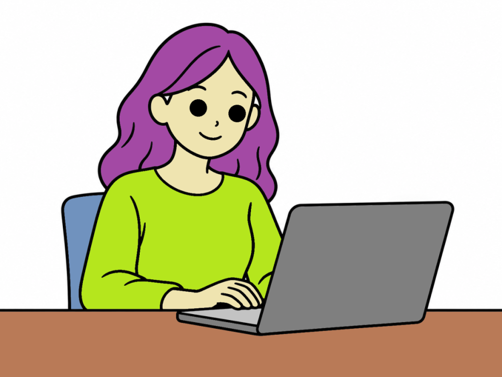 パソコンに向かって落ち着いた表情で仕事をしている女性